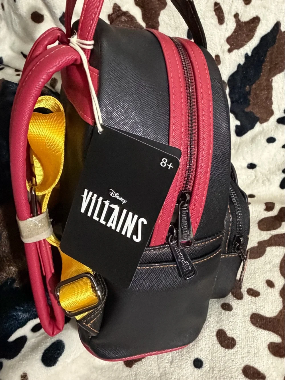 Loungefly Black Mini Backpack with Pink Trim and Yellow Stitching